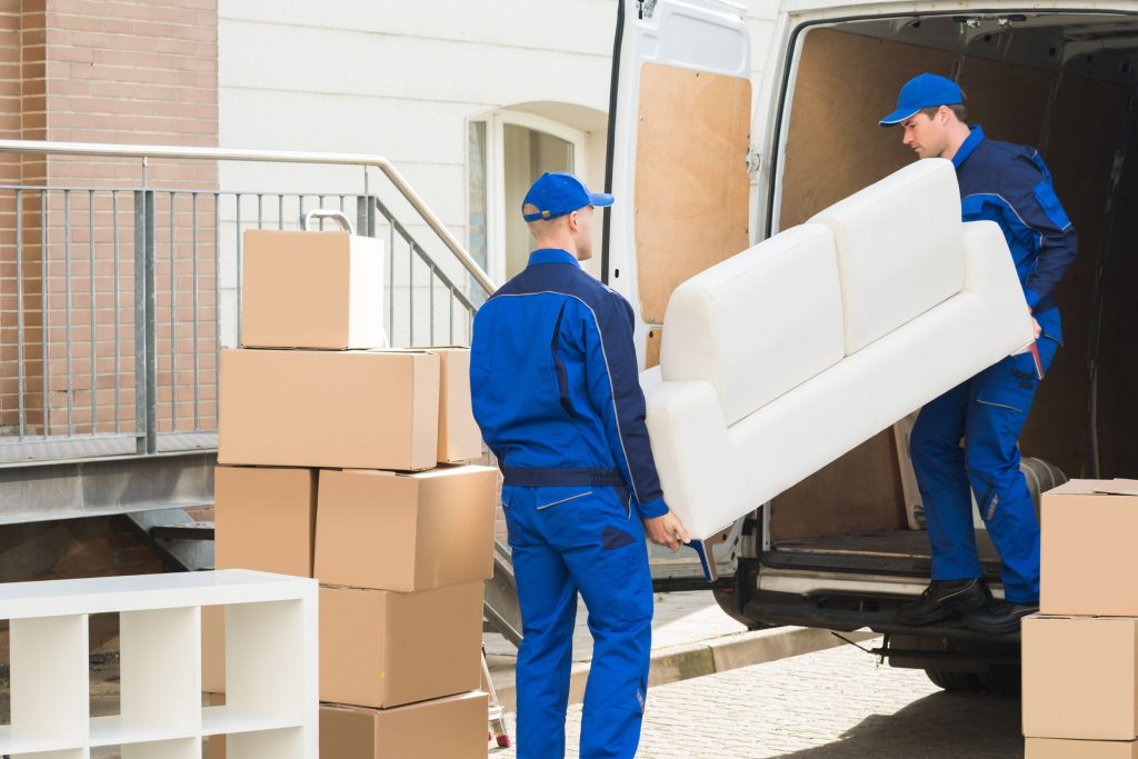 Two Men Filling a Van - Man and Van St Helens